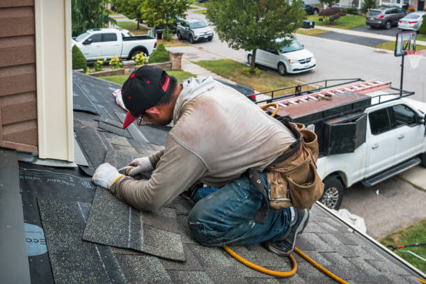 Professional Gutter Repair And Installation technician working in Bernhards Bay, NY